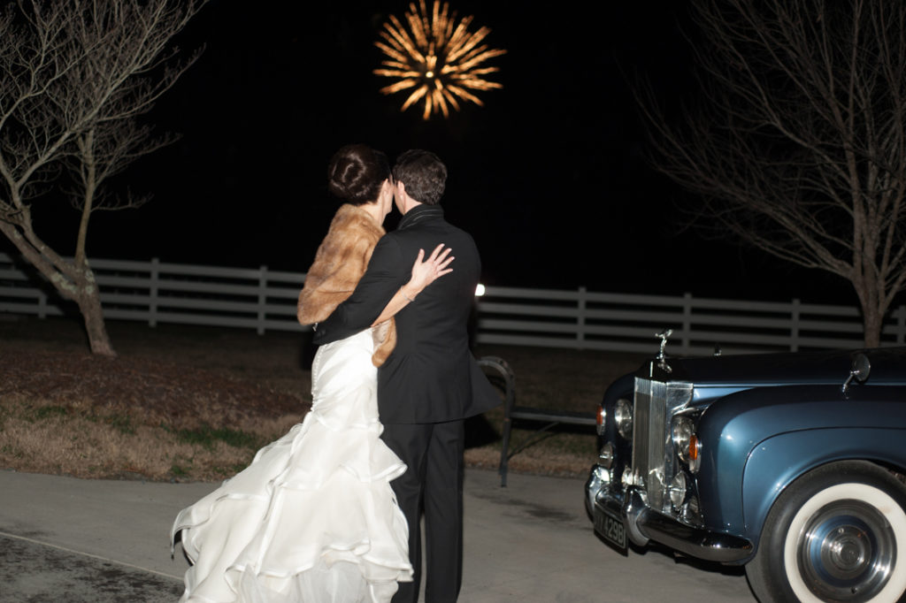 Bride and Groom viewing fireworks at wedding captured in wedding video