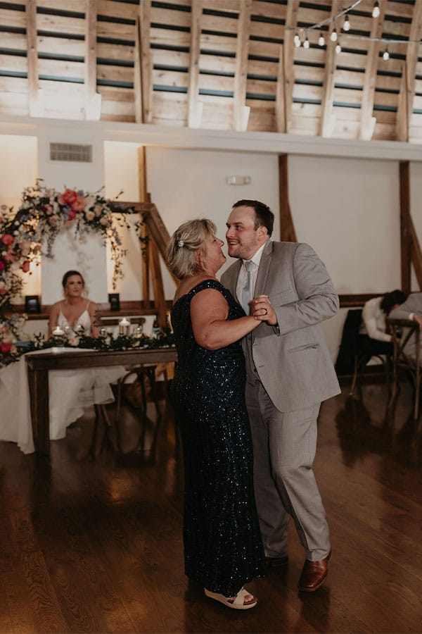 The groom dancing with his mother.