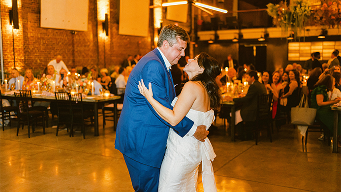 The bride and groom sharing their first dance.