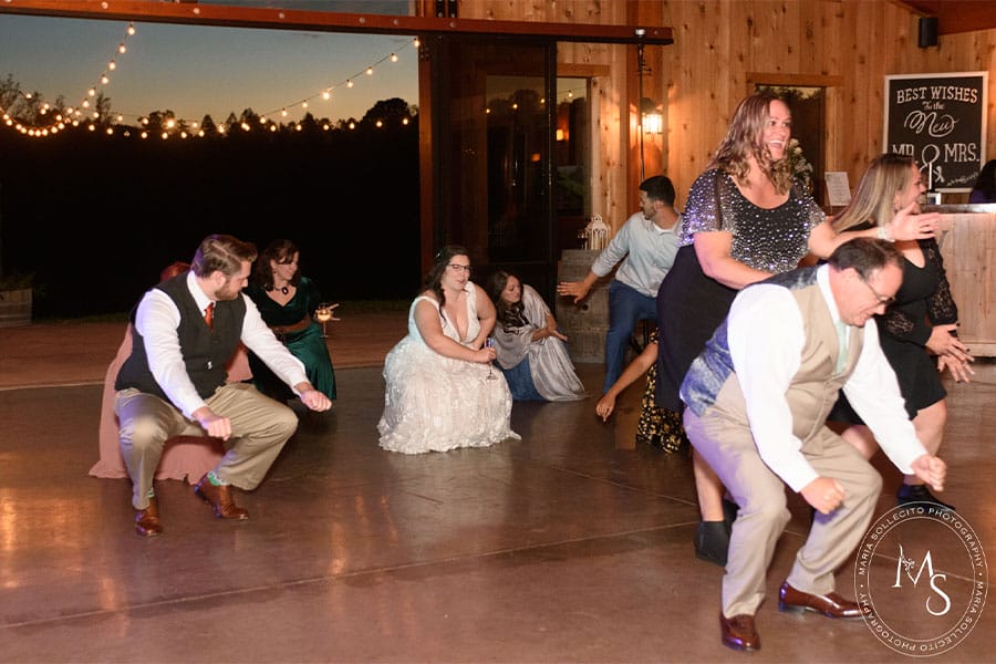 The couple and their loved ones on the dance floor.