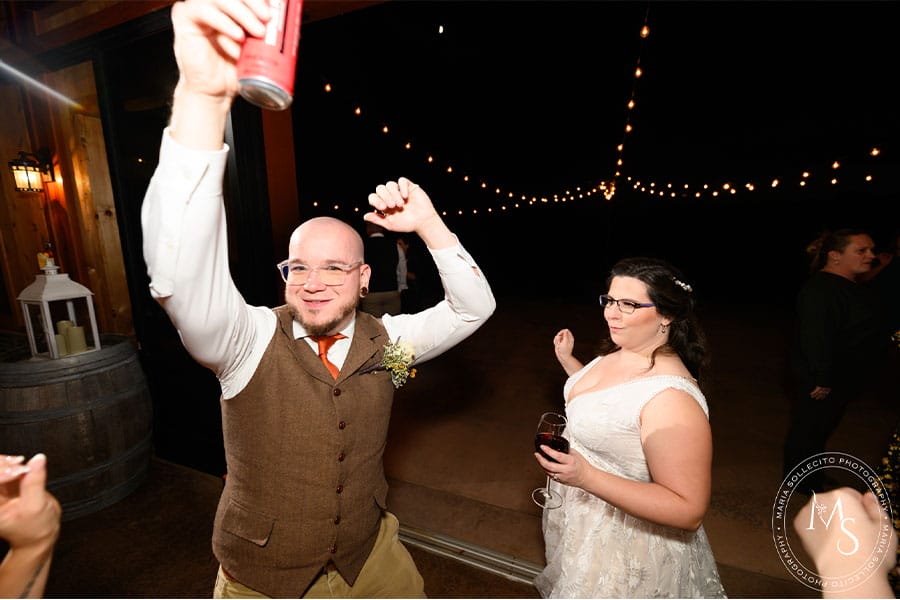 The bride and groom dancing.