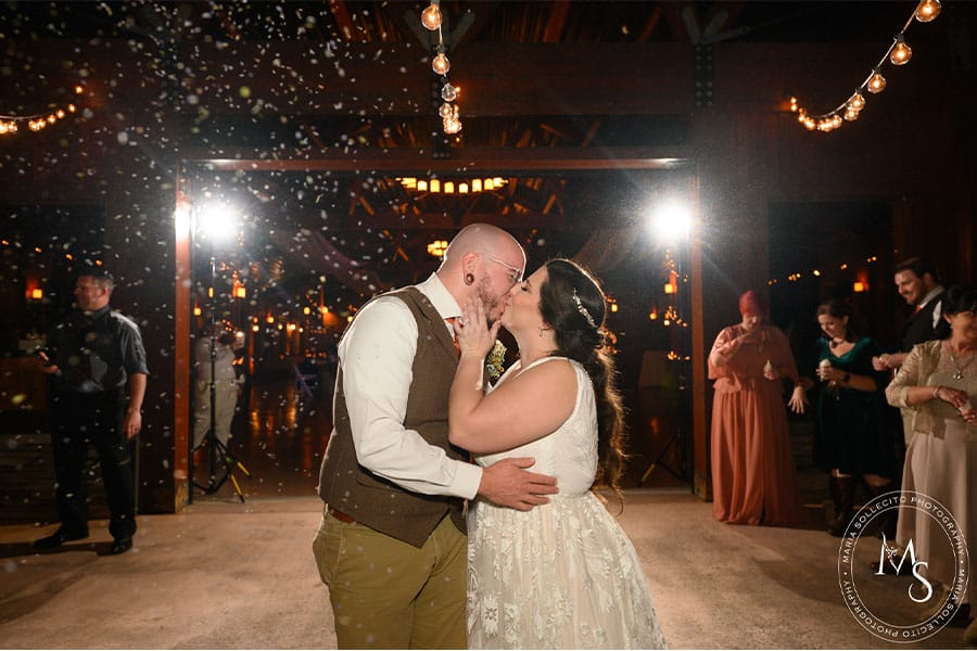 The bride and groom sharing a special kiss on the dance floor. 