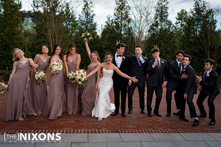 The bride and groom with their brides maids and groomsmen. 