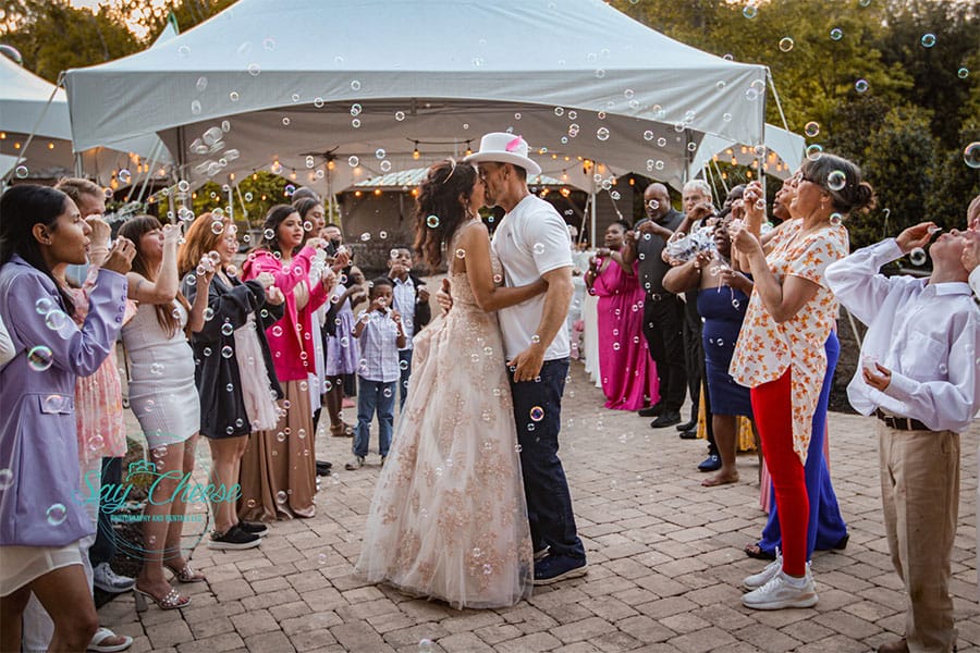 The bride and groom dancing together. 