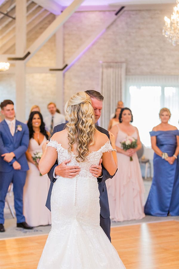 The reception began with formal introductions. The wedding party made their grand entrance, then the couple, Mr. & Mrs. Alex and Brittany Gross. The newlyweds shared their first dance, followed by special dances for Brittany and her father, and Alex and his mother.