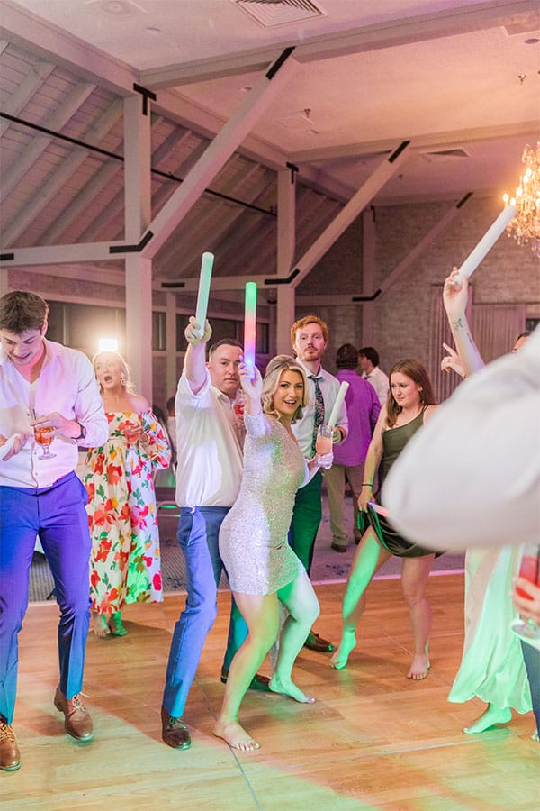 The bride and groom dancing together. 