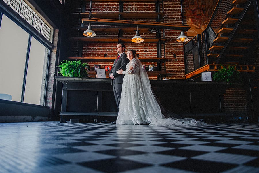 The bride and groom standing together.