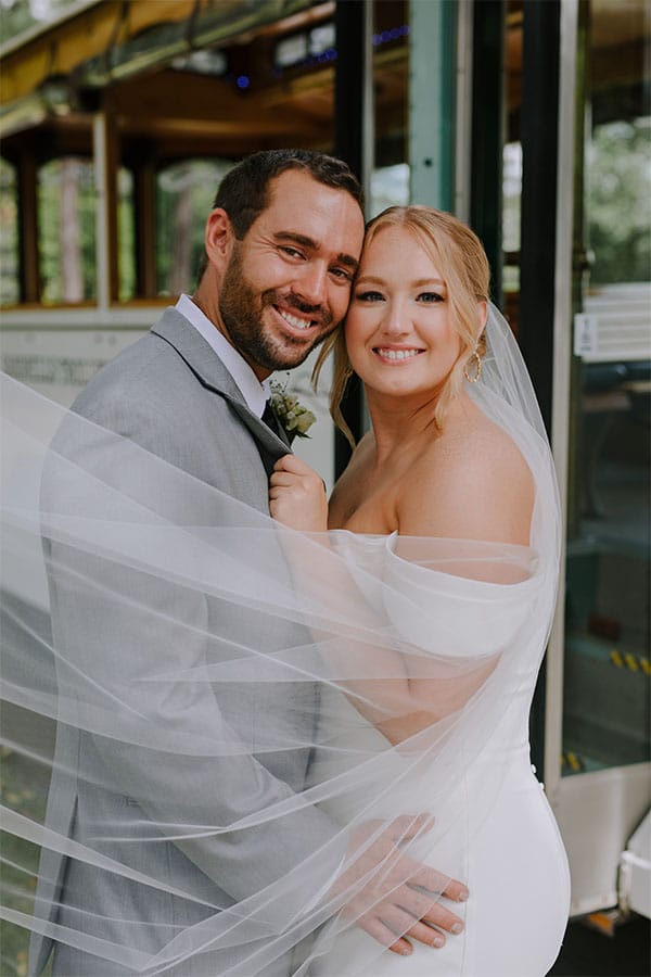 The bride and groom with each other.