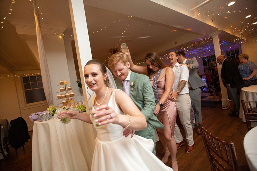 The bride and groom dancing.