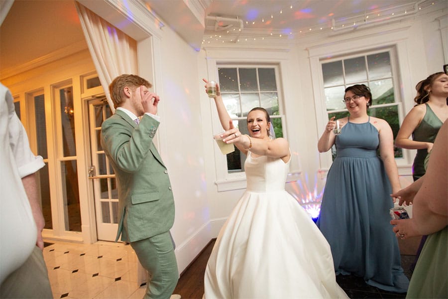 The bride and groom dancing.