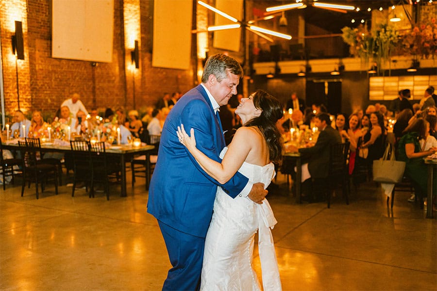 The bride and groom sharing their first dance. 