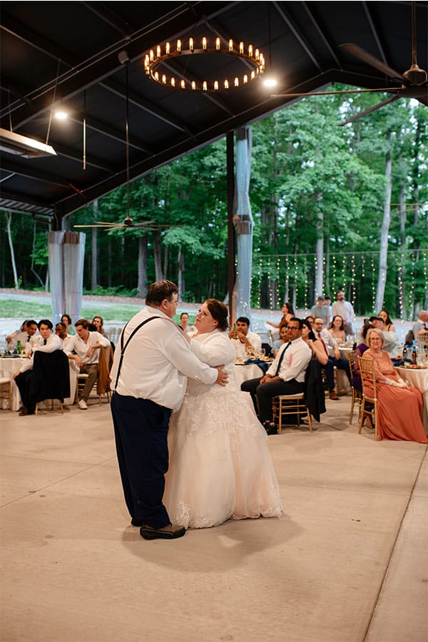 The bride dancing with her father. 