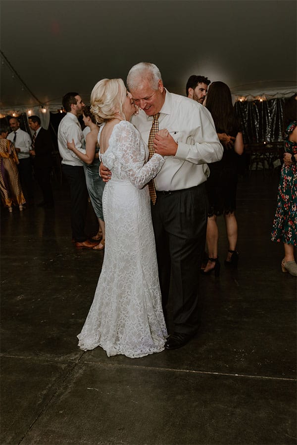 The bride and groom sharing there first dance. 