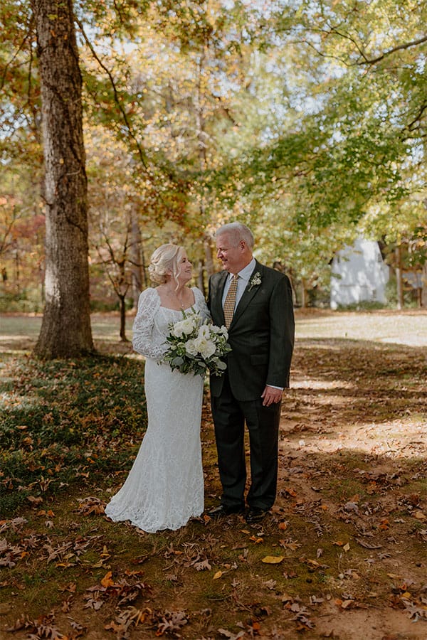 The bride and groom looking at each other. 