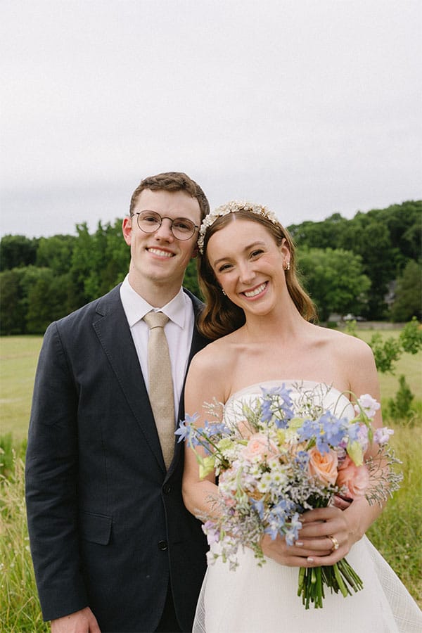 The bride and groom standing together.
