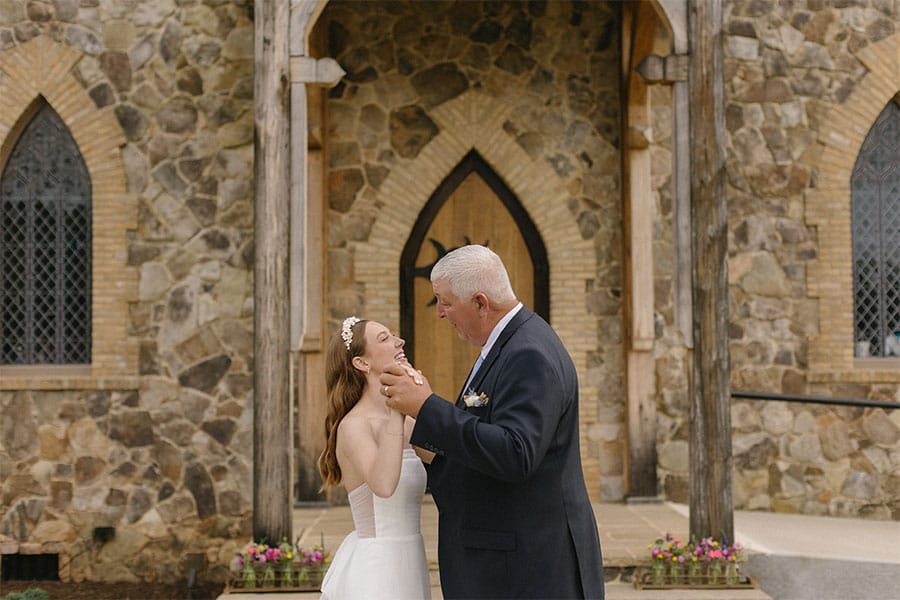 The bride dancing with her father. 