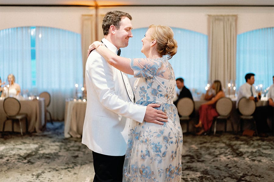 The groom dancing with his mother. 