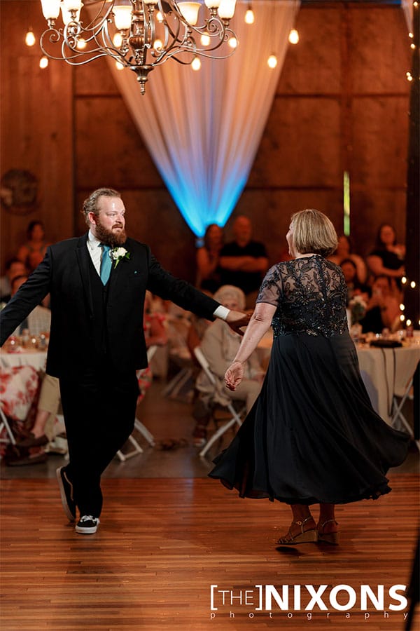 The groom dancing with his mother.