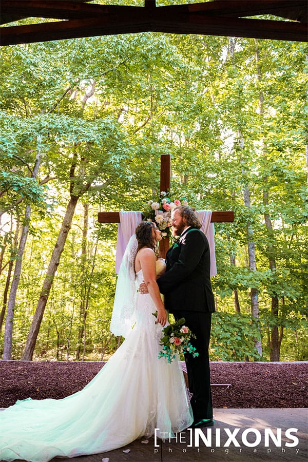 The bride and groom at the alter.