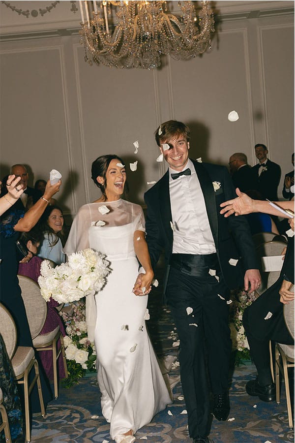 The bride and groom leaving the alter.