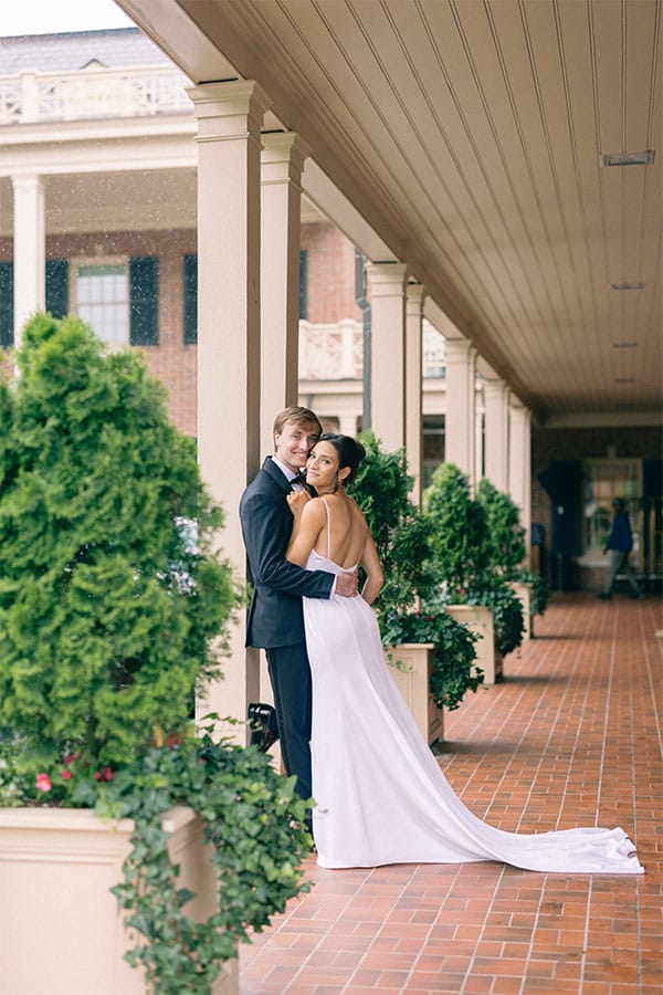 The bride and groom standing together.