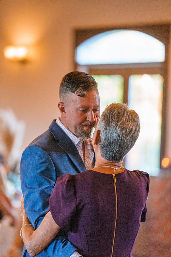 The groom dancing with his mother.
