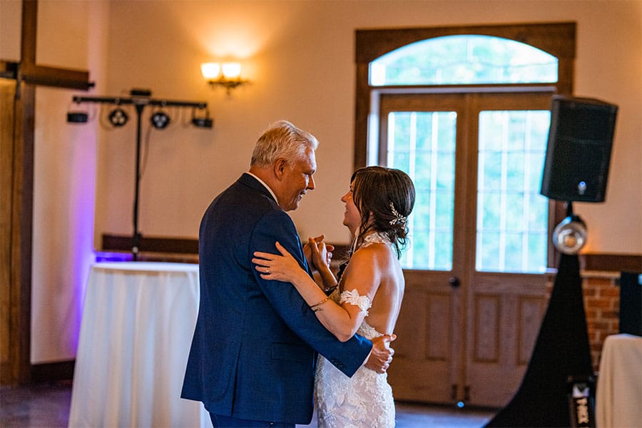 The bride dancing with her father.
