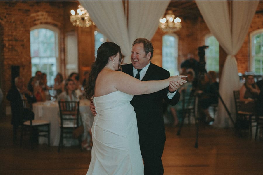 The bride dancing with her father. 