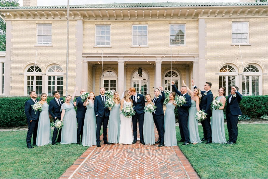 The bride and groom with their bridesmaids and groomsmen. 