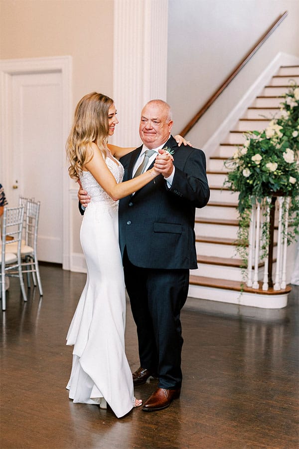 The bride dancing with her father.