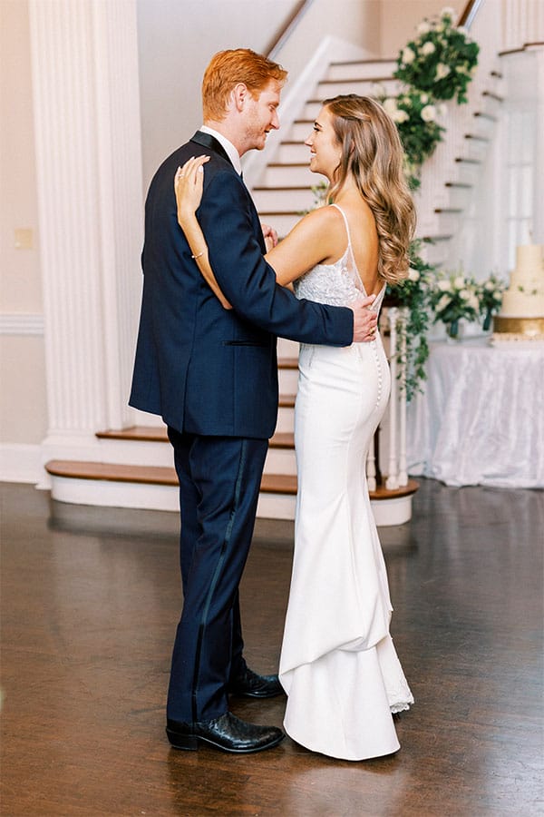 The bride and groom sharing their first dance. 