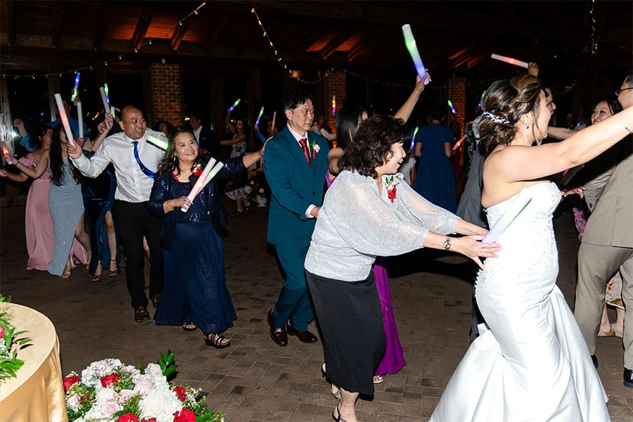 The bride and groom dancing together.