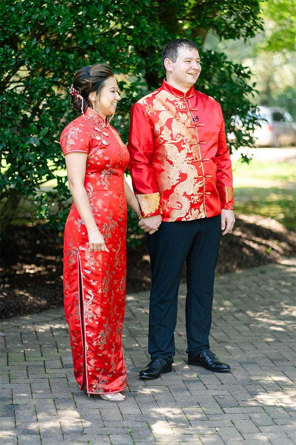 The bride and groom standing together. 
