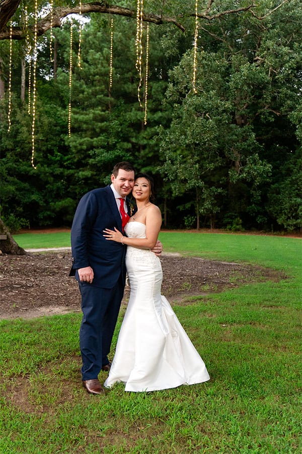 The bride and groom standing together. 